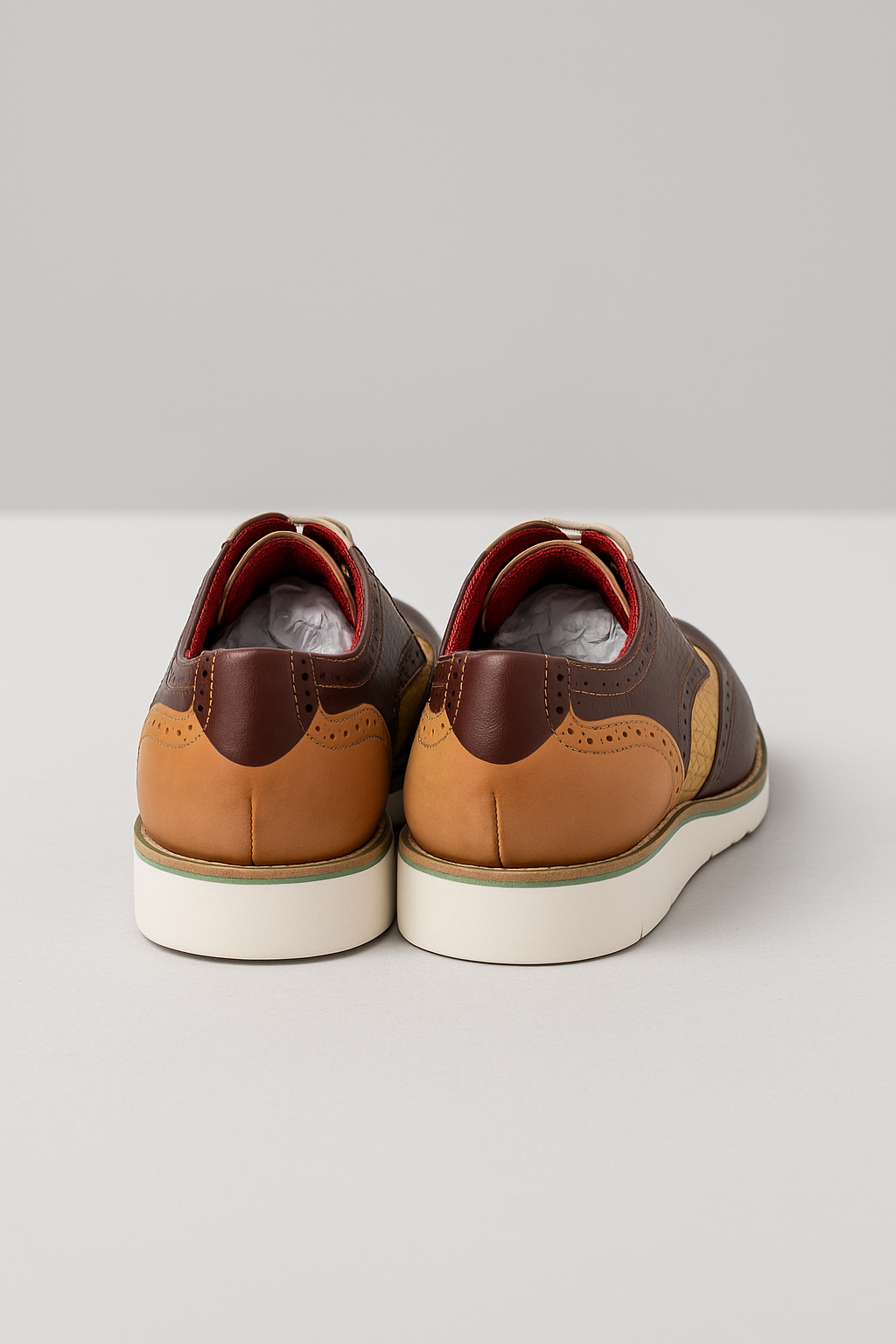 Chaussures derby tressées bicolores en cuir marron et beige