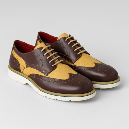 Chaussures derby tressées bicolores en cuir marron et beige